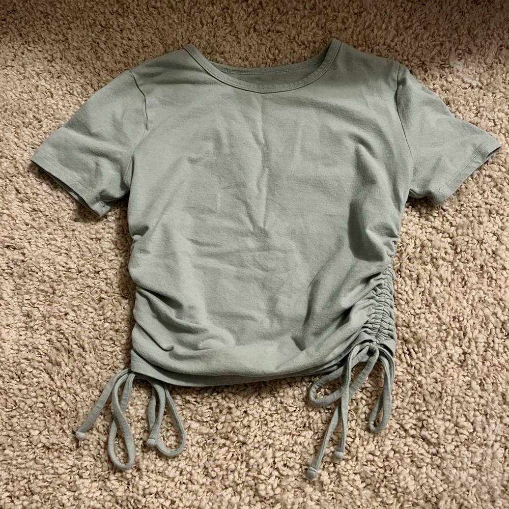 A teal Hollister baby tee.